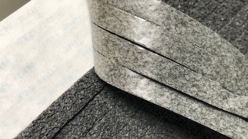 Strips of foam with rubber-based pressure sensitive adhesive backing